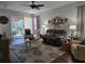 Spacious living room with comfy seating and hardwood floors at 1890 San Trovaso Way, Venice, FL 34285