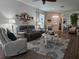 Bright living room with comfy seating and decorative accents at 1890 San Trovaso Way, Venice, FL 34285