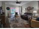 Spacious living room with comfy seating and hardwood floors at 1890 San Trovaso Way, Venice, FL 34285