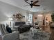 Spacious living room with comfy seating and hardwood floors at 1890 San Trovaso Way, Venice, FL 34285