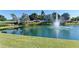 Ornamental pond with fountain and community signage at 1890 San Trovaso Way, Venice, FL 34285