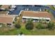 Aerial view showing building exterior and landscaping at 1953 Settlement Rd # 14, Venice, FL 34285