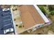 Aerial view showcasing building exterior and parking at 1953 Settlement Rd # 14, Venice, FL 34285