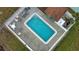 Relaxing community pool with ample seating at 1953 Settlement Rd # 14, Venice, FL 34285