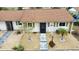 Tan house with brown roof, small front yard, and walkway at 1953 Settlement Rd # 14, Venice, FL 34285