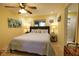 King-size bed, ensuite bathroom access, and ample natural light at 1953 Settlement Rd # 14, Venice, FL 34285