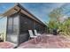 Relaxing screened patio with tile flooring and seating area at 1953 Settlement Rd # 14, Venice, FL 34285