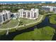 Condo building highlighting a specific unit with water view at 2020 Harbourside Dr # 424, Longboat Key, FL 34228