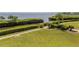 Aerial view of waterfront property with lush landscaping at 2020 Harbourside Dr # 424, Longboat Key, FL 34228