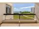 Spacious balcony overlooking a waterfront park and bay at 2020 Harbourside Dr # 424, Longboat Key, FL 34228