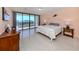 Bright bedroom with water views and a comfortable bed at 2020 Harbourside Dr # 424, Longboat Key, FL 34228