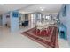 Bright dining area with a round table and waterfront view at 2020 Harbourside Dr # 424, Longboat Key, FL 34228