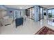 Spacious living room with water views and stylish furnishings at 2020 Harbourside Dr # 424, Longboat Key, FL 34228