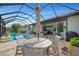 Enjoy dining al fresco by the pool at 20323 Granlago Dr, Venice, FL 34293