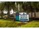 Venice Beach sign at entrance to a park with palm trees at 205 Carlino Dr, Nokomis, FL 34275