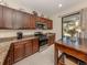 Kitchen with granite countertops and stainless steel appliances at 205 Carlino Dr, Nokomis, FL 34275