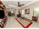 Living room with hardwood floors, comfortable seating, and an open floor plan at 205 Carlino Dr, Nokomis, FL 34275