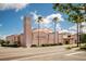 Pink-colored Venice Theatre building with palm trees nearby at 205 Carlino Dr, Nokomis, FL 34275