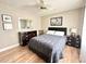 Cozy bedroom featuring a double bed and ample closet space at 212 San Carlos Ave, North Port, FL 34287