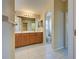 Primary bathroom with double vanity and separate toilet area at 2134 Boxwood St, North Port, FL 34289