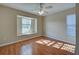 Bright bedroom with wood floors and a bay window at 2134 Boxwood St, North Port, FL 34289
