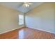 Spacious bedroom with wood floors and window at 2134 Boxwood St, North Port, FL 34289