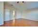 Spacious bedroom with wood flooring and ceiling fan at 2134 Boxwood St, North Port, FL 34289