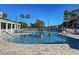 Resort-style community pool with plenty of seating at 2134 Boxwood St, North Port, FL 34289