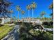 Community pool area with clubhouse and picnic tables at 2134 Boxwood St, North Port, FL 34289