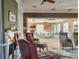 Community room with fireplace and comfortable seating at 2134 Boxwood St, North Port, FL 34289