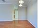 Simple dining room with wood flooring and neutral walls at 2134 Boxwood St, North Port, FL 34289
