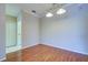 Simple dining room with wood flooring and neutral walls at 2134 Boxwood St, North Port, FL 34289