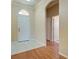 Bright entryway with tile flooring and wood accents at 2134 Boxwood St, North Port, FL 34289