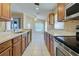 Open concept kitchen with ample counter space at 2134 Boxwood St, North Port, FL 34289