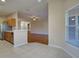 Kitchen features wood cabinets and tile flooring at 2134 Boxwood St, North Port, FL 34289