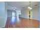 Spacious living room with wood flooring and access to the lanai at 2134 Boxwood St, North Port, FL 34289