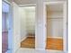 Walk-in pantry with wire shelving and wood flooring at 2134 Boxwood St, North Port, FL 34289