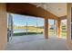 Relaxing screened porch overlooking a serene lake view at 2134 Boxwood St, North Port, FL 34289