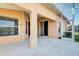 Screened patio with access to the backyard and lake at 2134 Boxwood St, North Port, FL 34289