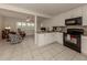 Kitchen with granite countertops, white cabinets, and stainless steel appliances at 214 Field E Ave # 1, Venice, FL 34285