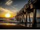 Stunning sunset view from a long pier at 214 Field E Ave # 1, Venice, FL 34285