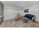 Relaxing screened porch with wicker furniture and tile floor at 214 Field E Ave # 1, Venice, FL 34285