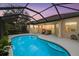 Inviting screened pool and patio area, perfect for outdoor relaxation at 2144 Calusa Lakes Blvd, Nokomis, FL 34275