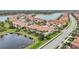 Aerial view of a luxury community with lakefront properties at 23253 Banbury Way, Venice, FL 34293