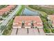Aerial view showcasing a beautiful home and desirable community at 23253 Banbury Way, Venice, FL 34293