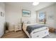Charming bedroom with a queen-size bed and coastal decor at 23253 Banbury Way, Venice, FL 34293