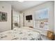 Bedroom with a queen bed, tv, and access to a loft at 23253 Banbury Way, Venice, FL 34293