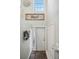Bright and airy entryway with high ceilings and neutral decor at 23253 Banbury Way, Venice, FL 34293