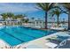 Community boasts a large resort-style pool with lounge chairs at 23253 Banbury Way, Venice, FL 34293