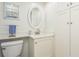 Updated bathroom with white cabinets and a modern vanity at 244 Saint Augustine Ave # 107, Venice, FL 34285